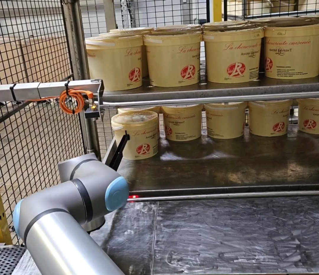 Cellule cobotique de manutention de seaux en agroalimentaire